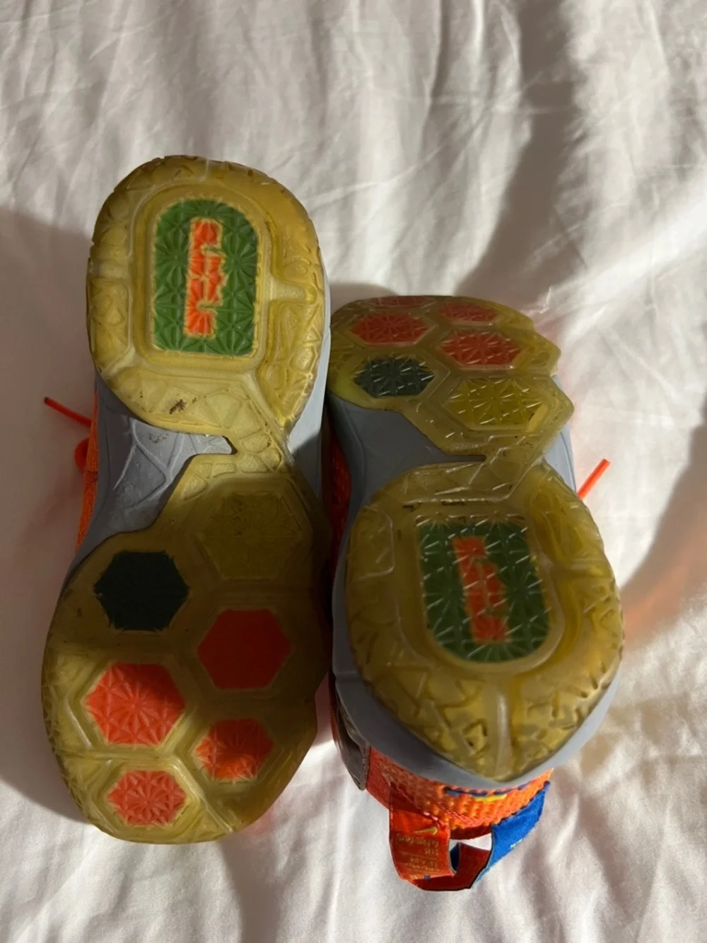 LeBron James Nike Orange Sneakers with Yellow Swoosh and Blue Lining